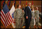 President George W. Bush addresses the media Thursday, Dec. 20, 2007, after visiting with wounded troops at Walter Reed Army Medical Center in Washington, D.C. White House photo by Joyce N. Boghosian