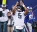 Donovan McNabb celebrates after the Eagles scored a touchdown during the fourth quarter of an NFL divisional playoff game against the New York Giants on Sunday.