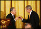 President George W. Bush shares a toast with Colombian President Alvaro Uribe Saturday, Sept. 20, 2008, during a social dinner with the President of Colombia at the White House. White House photo by Joyce N. Boghosian