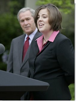 President George W. Bush listens as Andrea Peterson, 2007 National Teacher of the Year, speaks during ceremonies Thursday, April 26, 2007, in the Rose Garden. Said the President, "This is a special day for all who care deeply about education, because we fully understand that without a good teacher it's hard to achieve national goals and objectives."  White House photo by Eric Draper