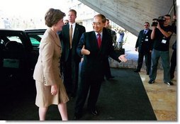 Laura Bush is welcomed to UNESCO headquarters in Paris by UNESCO director Koichiro Matsuura for formal ceremonies celebrating the renewed participation of the United States Sept. 9, 2003.  White House photo by Susan Sterner