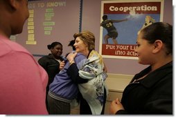 Laura Bush greets students at a reading class while visiting Chipman Middle School in Alameda, Calif., April 28, 2005.  White House photo by Krisanne Johnson