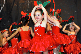 Children enrolled in Fort Meade Schools of Knowledge, Inspiration, Exploration and Skills Unlimited classes perform Dec. 13 during the SKIES Winter Showcase at Fort Meade’s School Age Services.