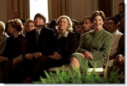 Hosting the Mark Twain Symposium, Laura Bush sits with documentary filmmaker Ken Burns in the East Room Nov. 29, 2001.   White House photo by Susan Sterner