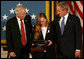 President George W. Bush stands with Dan and Maureen Murphy, parents of Lt. Michael P. Murphy, after the Navy SEAL was honored posthumously with the Medal of Honor during ceremonies Monday, Oct. 22, 2007, in the East Room of the White House. White House photo by Joyce N. Boghosian