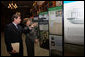 Mrs. Laura Bush is shown the "Abraham Lincoln: A Man of His Time, A Man for All Times' exhibition, Friday, Oct. 24, 2008 in New York City by Dr. James Basker, President of the Gilder Lehrman Institute of American History. The tour at the Lincoln Room of Union League Club in New York City was immediately prior to the Fifth Annual Preserve America History Teacher of the Year Award ceremony. White House photo by Chris Greenberg