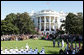 President George W. Bush and Mrs. Laura Bush welcome President John Agyekum Kufuor and Mrs. Theresa Kufuor of Ghana Monday, Sept. 15, 2008, during the South Lawn Arrival Ceremony for President Kufuor and Mrs. Kufuor of Ghana on the South Lawn of the White House. White House photo by Chris Greenberg