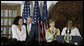 President George W. Bush congratulates singer Jordin Sparks after she sang the U.S. National Anthem Wednesday, Feb. 20, 2008, during the welcome for President Bush and Mrs. Laura Bush to the U.S. Ambassador's Residence in Accra, Ghana, by Ambassador Pamela Bridgewater. White House photo by Shealah Craighead