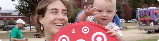 Mother and young child with Target cushion