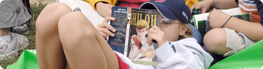 A young girl reading Shiloh
