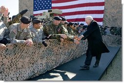 Vice President Dick Cheney greets U.S. Army troops Tuesday, Feb. 26, 2008 during a rally for the First Cavalry Division at Fort Hood, Texas. White House photo by David Bohrer