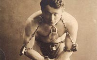 Photograph of Harry Houdini in chains