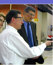 Inslee learns about Kirkland-based Spectra Lux, which makes illuminated displays for the Boeing 777.