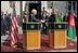 Vice President Dick Cheney and Afghanistan President Hamid Karzai shake hands during a press availability at the Presidential Palace in Kabul, Afghanistan, Dec. 7, 2004.