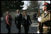 Laura Bush arrives at the Presidential Palace accompanied by U.S. Ambassador to Afghanistan Zalmay Khalilzad and Under Secretary of State for Global Affairs Paula Dobriansky in Kabul, Afghanistan Wednesday, March 30, 2005. 