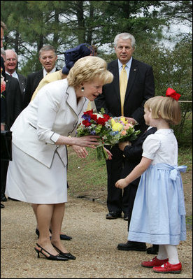 Mrs. Lynne Cheney receives a bouquet of flowers Friday, May 4, 2007, during a tour of Jamestown Settlement in Williamsburg, Virginia. White House photo by David Bohrer