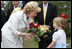 Mrs. Lynne Cheney receives a bouquet of flowers Friday, May 4, 2007, during a tour of Jamestown Settlement in Williamsburg, Virginia. White House photo by David Bohrer