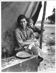 Migrant agricultural worker's family. [mother with baby in lap, child behind her]