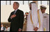 President George W. Bush and King Abdullah bin Adbulaziz pause for the playing of their respective national anthems Friday, May 16, 2008, during arrival ceremonies for the President and Mrs. Laura Bush at Riyadh-King Khaled International Airport in Riyadh.