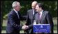 President George W Bush shakes hands with Janez Jansa, Prime Minister of Slovenia, and Jose Manuel Barroso, President of the European Commission, following the United States - European Union Meeting Tuesday, June 10, 2008, at Brdo Castle in Kranj, Slovenia. White House photo by Chris Greenberg