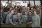 Mrs. Laura Bush poses for a photo with US troops during her visit to Bagram Air Force Base Sunday, June 8, 2008, in Bagram, Afghanistan. White House photo by Shealah Craighead