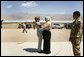 Mrs. Laura Bush is greeted by Governor Habiba Sarabi after arriving in Bamiyan province Sunday, June 8, 2008. Appointed in 2005, the former Minister of Women’s Affairs is the only female governor in Afghanistan. White House photo by Shealah Craighead