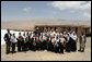 Mrs. Laura Bush is joined by Habiba Sarabi, Governor of Bamiran Province, right, and students of the Ayenda Learning Center Sunday, June 8, 2008, during a tour of the school's construction site in Bamiyan, Afghanistan. White House photo by Shealah Craighead