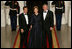 President George W. Bush and Mrs. Laura Bush stand with President Nicolas Sarkozy of France on the North Portico of the White House after his arrival for dinner Tuesday, Nov. 6, 2007.