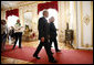 President George W. Bush is welcomed to Hofburg Palace in Vienna Wednesday, June 21, 2006, by Austria's President Heinz Fischer. Following them are U.S. Secretary of State Condoleezza Rice and Ursula Plassnik, Austria's Federal Minister of Foreign Affairs. White House photo by Eric Draper