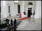 President George W. Bush and Mrs. Laura Bush welcome President of Colombia Alvaro Uribe Saturday, Sept. 20, 2008, to a social dinner at the White House. White House photo by Grant Miller