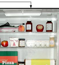 Photo:  shelves of food inside refrigerator.