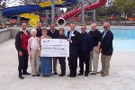 Check presentation to Prairie Energy Cooperative to support renovation of the Clarion, Iowa swimming pool