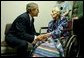 President George W. Bush visits with 94-year-old Anna Tovcimak, who is a hospice patient, after a roundtable discussion on Medical Liability Reform at Mercy Hospital in Scranton, Pa, Jan. 16, 2003. "I appreciate you all. giving me a chance to talk about a significant problem which faces America," said President Bush in his remarks. "And that problem is the fact that our medical liability system is broken, and therefore, a lot of Americans don't have access to affordable health care." White House photo by Tina Hager