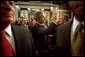 After delivering his State of the Union speech, President Bush waves to his wife, Laura Bush, as he leaves the House Chamber at the U.S. Capitol Tuesday, Jan. 28, 2003. White House photo by Eric Draper