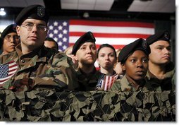 Army troops and personnel listen to President George W. Bush during his visit to Fort Hood in Killeen, Texas, Friday, Jan. 3, 2003. "Ft. Hood and the units that call it home have a special place in our country's military history, said the President. "For decades, soldiers from the First Team and the Iron Horse Division, and from other units, have fought America's battles with distinction and courage."  White House photo by Eric Draper