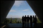 President George W. Bush, center, is silhouetted as he views Jerusalem from Yad Vashem, the Holocaust Museum, Friday, Jan. 11, 2008. The President was joined by Secretary of State Condoleezza Rice, right, Israel's Prime Minister Ehud Olmert, second from left, and Israel's President Shimon Peres during the visit. White House photo by Eric Draper