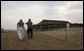 President George W. Bush and Crown Prince Sheikh Mohammed bin Zayed Al Nayhan walk a path in the desert prior to dinner Sunday, Jan. 13, 2008, near Abu Dhabi. White House photo by Eric Draper