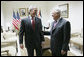 President George W. Bush and President Mahmoud Abbas of the Palestinian Authority share a moment before their joint press availability Thursday, Jan. 10, 2008, in Ramallah. White House photo by Eric Draper