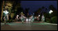 Escorted by a ceremonial horse procession, the limousine carrying President George W. Bush arrives at the Guest Palace Monday, Jan. 14, 2008, in Riyadh, Saudi Arabia. White House photo by Chris Greenberg