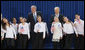 President George W. Bush poses with President Shimon Peres of Israel and 10 children who performed during their meeting Wednesday, Jan. 9, 2008, at the President Peres’ residence in Jerusalem. White House photo by Eric Draper