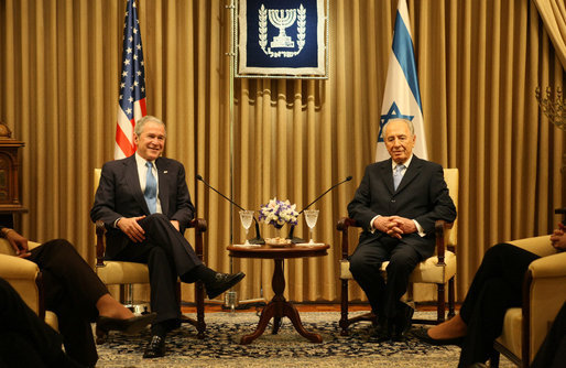 President George W. Bush and President Shimon Peres of Israel pose for the cameras before their meeting Wednesday, Jan. 9, 2008, at President Peres’ Jerusalem residence. White House photo by Eric Draper