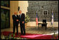 President George W. Bush and President Shimon Peres of Israel shake hands after meeting Wednesday, Jan. 9, 2008, at the Israeli President’s residence in Jerusalem. White House photo by Eric Draper