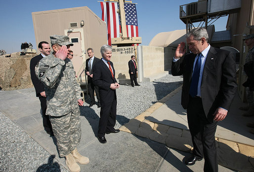 President George W. Bush nods his head and salutes Gen. David Petraeus as he departs Camp Arifjan Saturday, Jan. 12, 2008, during his last stop in Kuwait. White House photo by Eric Draper