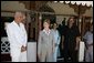 Laura Bush visits with President Amani Abeid Karume, pictured in black, at right, in Zanzibar, Tanzania, Thursday, July 14, 2005. White House photo by Krisanne Johnson