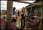 Jenna Bush talks with children during a visit Al Rahma Madrasa Pre-School in Zanzibar, Tanzania, Thursday July 14, 2005. White House photo by Krisanne Johnson