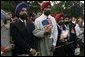 Invited guests are seen at the official arrival ceremony for India's Prime Minister Dr. Manmohan Singh, Monday, July 18, 2005, on the South Lawn of the White House. White House photo by Krisanne Johnson