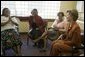 Laura Bush meets with women from Mothers to Mothers-to-Be in Cape Town, South Africa, Tuesday, July 12, 2005. The program provides support to HIV-positive women during their pregnancy. White House photo by Krisanne Johnson