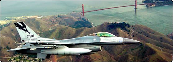 Photo of F-16 Fighting Falcon flying over the Golden Gate Bridge-California National Guard.