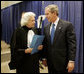 President George W. Bush and Supreme Court Justice Sandra Day O’Connor share a moment backstage March 3, 2005, prior to the swearing-in ceremonies for Michael Chertoff as secretary of Homeland Security. In response to the Justice’s resignation, President Bush called her one of the most admired women of her time and said he was proud to know her. File photo. White House photo by Paul Morse