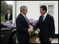 President George W. Bush is greeted by Danish Prime Minister Anders Fogh Rasmussen at his summer residence in Marienborg in Kongens Lyngby, Denmark, Wednesday, July 6, 2005. White House photo by Paul Morse